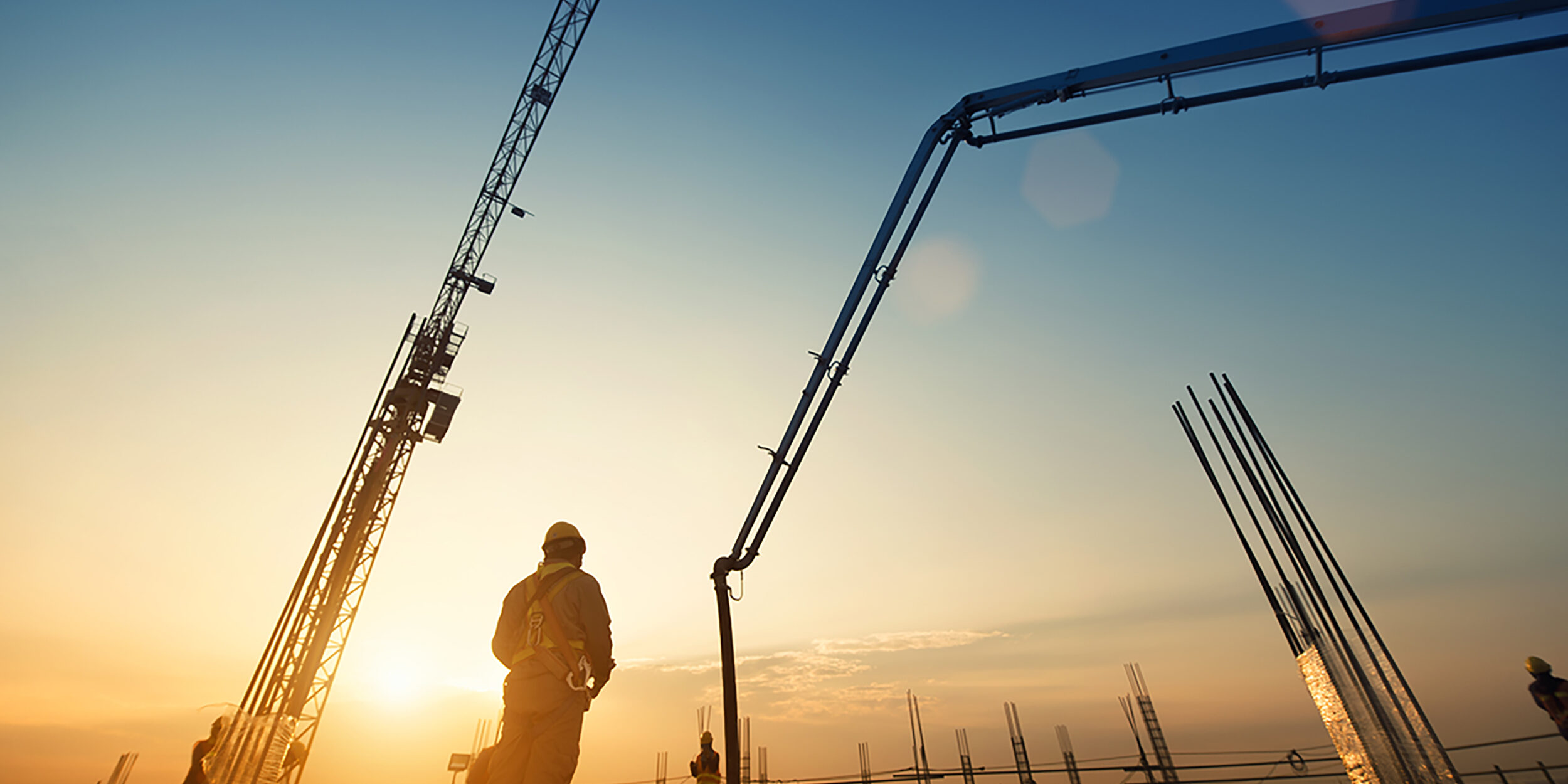 Construction worker Concrete pouring during commercial concretin Concrete Pump